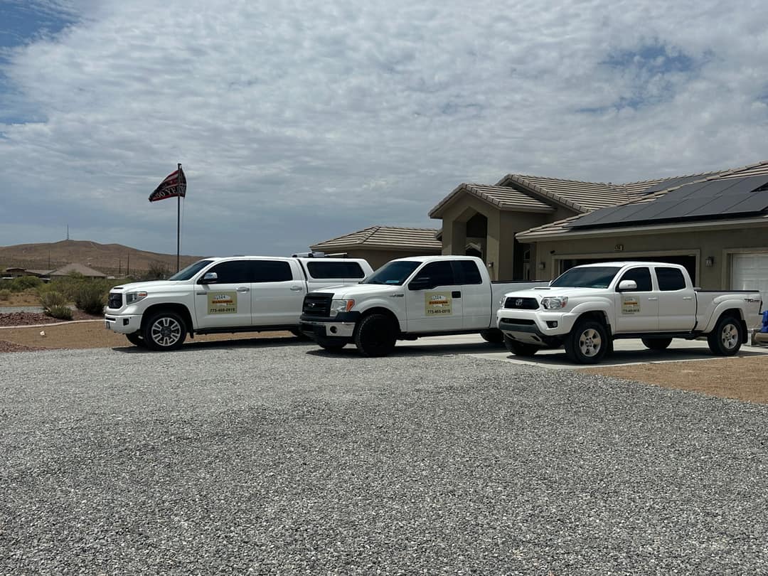 All In Pest Solutions service trucks on a job in the Pahrump valley